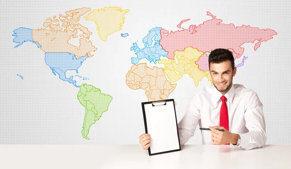 Affärsman med färgglada världskarta bakgrund — Stockfoto