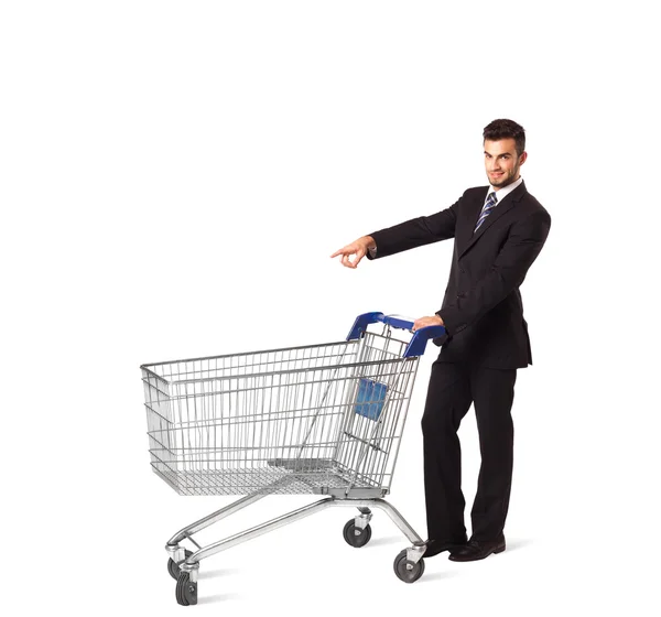 Empresario con carrito de compras — Foto de Stock