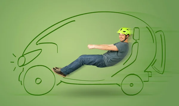 Man rijdt een eco friendy elektrische met de hand getrokken auto — Stockfoto
