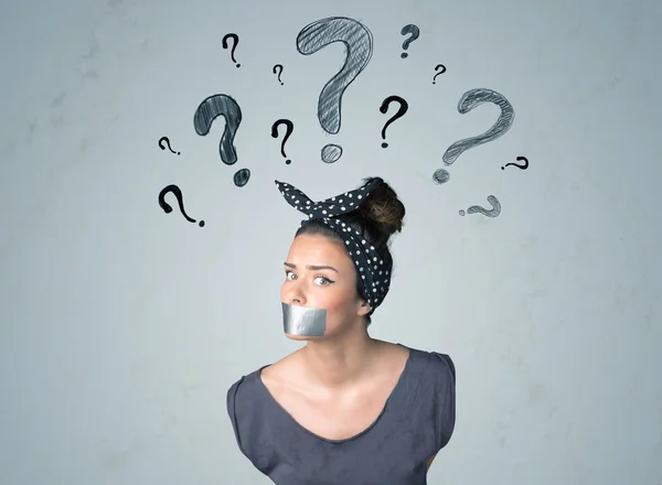 Young woman with glued mouth and question mark symbols — Stock Photo, Image