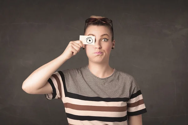 Funny woman looking with hand drawn paper eyes — Stock Photo, Image