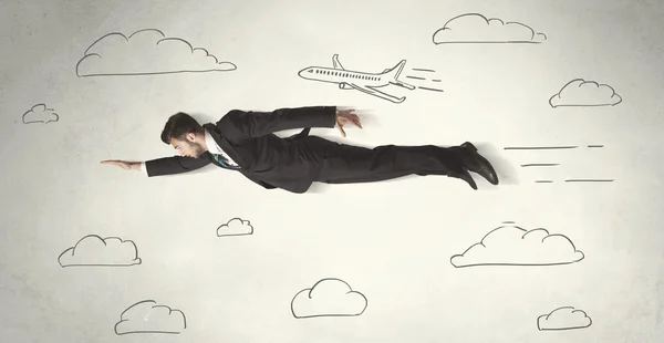 Cheerful business person flying between hand drawn sky clouds — Stock Photo, Image