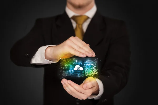 Businessman holding data cloud — Stock Photo, Image