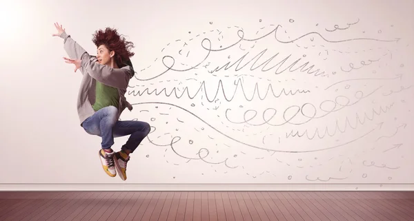 Pretty woman jumping with hand drawn lines and arrows come out — Stock Photo, Image