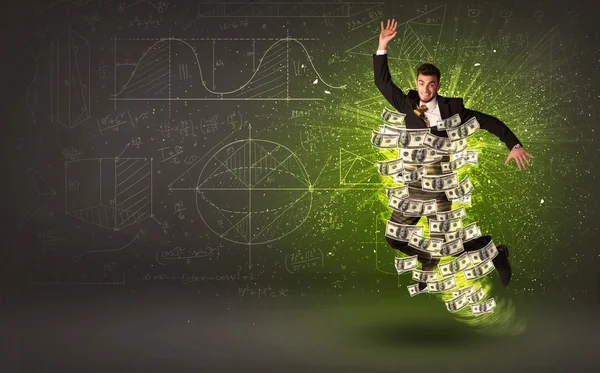 Cheerful businesman jumping with dollar banknotes around him — Stock Photo, Image