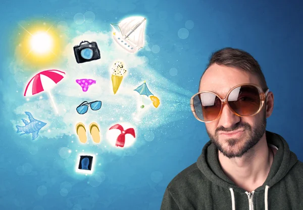 Feliz hombre alegre con gafas de sol mirando iconos de verano —  Fotos de Stock