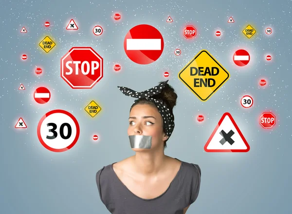 Young woman with glued mouth and traffic signals — Stock Photo, Image