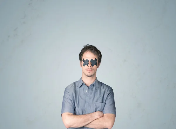 Young man with glued eye — Stock Photo, Image