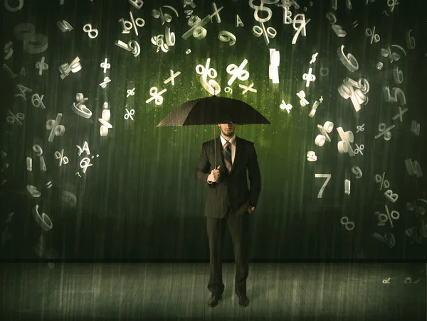 Homme d'affaires debout avec parapluie et numéros 3d pluie concéder — Photo