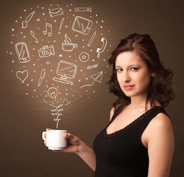 Businesswoman holding a white cup with social media icons — Stock Photo, Image