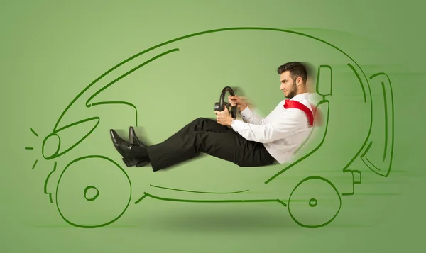 El hombre conduce un coche eléctrico ecológico dibujado a mano —  Fotos de Stock