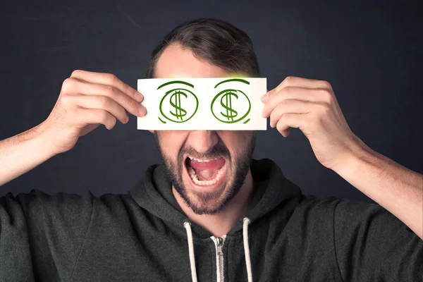 Mann hält ein Papier mit handgezeichnetem Dollarzeichen — Stockfoto