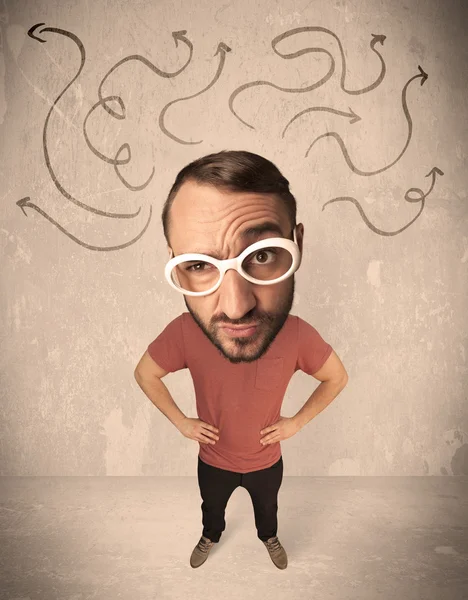 Big head person with arrows — Stock Photo, Image