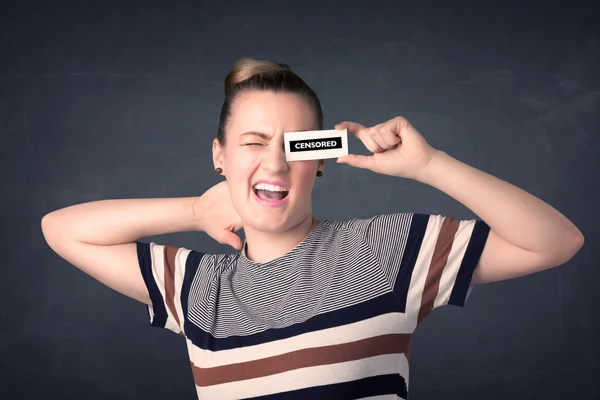 Pretty girl with censored paper sign — Stock Photo, Image