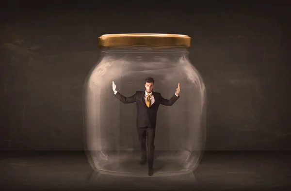 Businessman shut into a glass jar concept — Stock Photo, Image