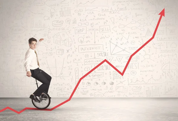 Business parson riding unicycle on an uprising red arrow — Stock Photo, Image