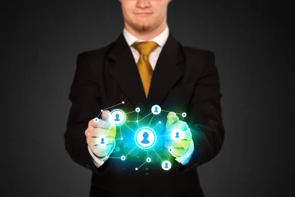 Businessman holding social media network — Stock Photo, Image