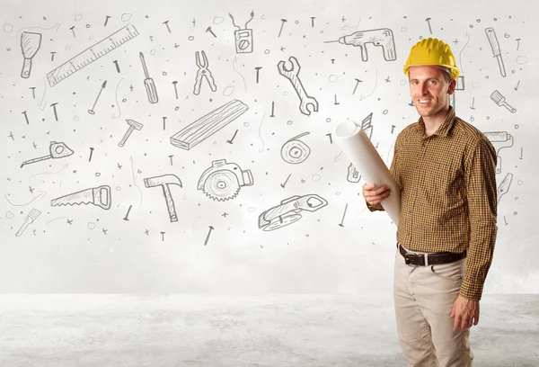 Construction worker planing with hand drawn tool icons — Stock Photo, Image