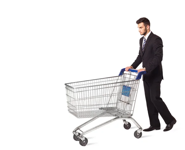 ショッピングカートを持つビジネスマン — ストック写真