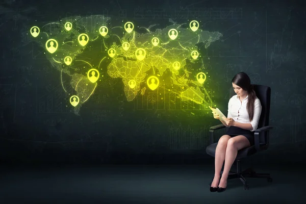 Businesswoman in office with tablet and social network world map — Stock Photo, Image