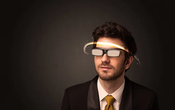 Handsome man looking with futuristic high tech glasses — Stock Photo, Image