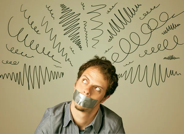 Young man with glued mouth and curly lines — Stock Photo, Image