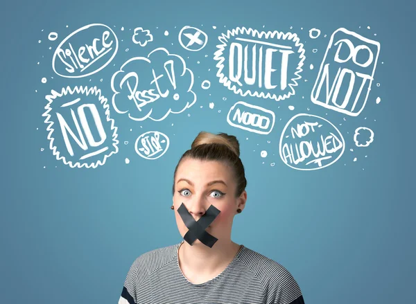 Young woman with glued mouth and thought clouds — Stock Photo, Image