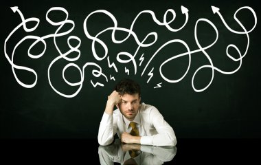 Depresyondaki işadamı çizgili çizgiler altında oturuyor