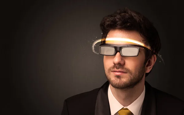 Handsome man looking with futuristic high tech glasses — Stock Photo, Image