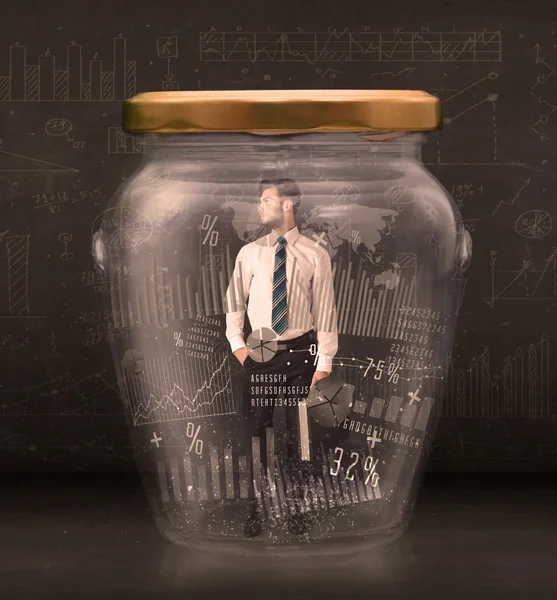 Businessman traped in jar with graph chart symbols concept — Stock Photo, Image