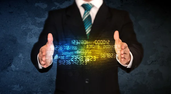 Businessman holding number cloud — Stock Photo, Image