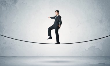 Satış adam sıkı ipe Dengeleme
