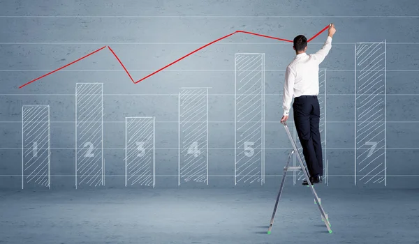 Mann zeichnet Diagramm von Leiter — Stockfoto