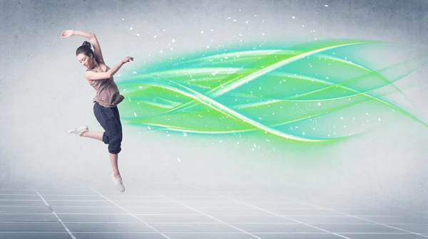 Hip hop dancer posing with green lines — Stock Photo, Image