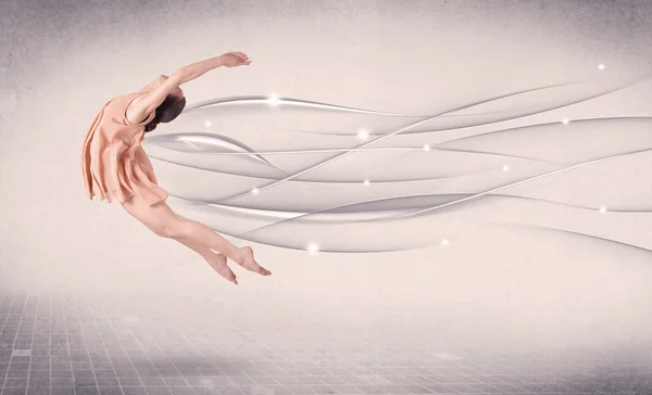 Танцівниця балету виконує сучасний танець з абстрактними лініями — стокове фото