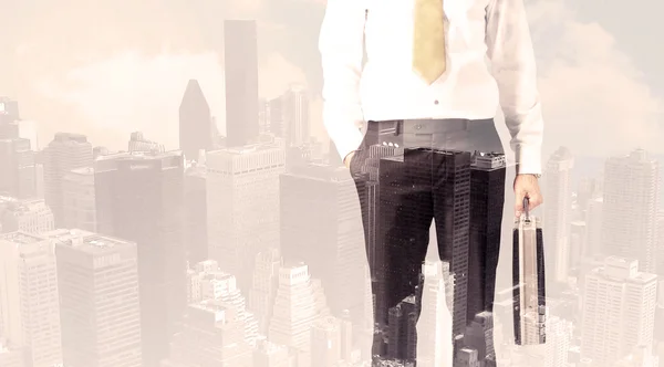 Handsome business man with overlay cityscape — Stock Photo, Image