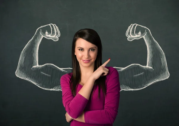 Žena s načrtnuté silné a svalnaté ruce — Stock fotografie