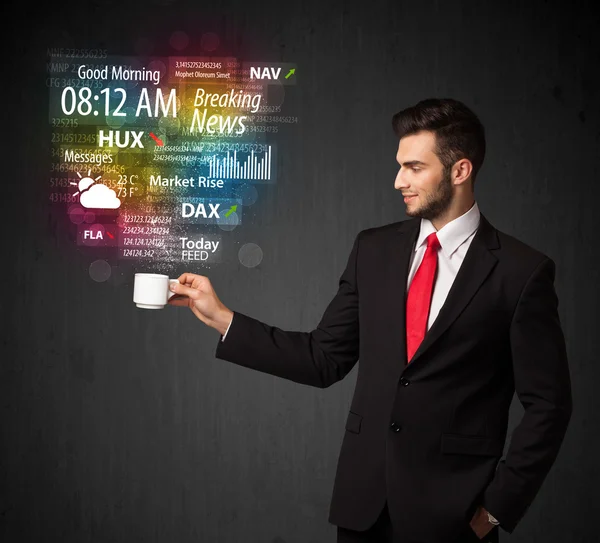 Businessman holding a white cup with daily news and information — Stock Photo, Image