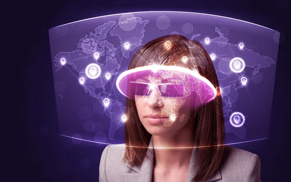 Young woman looking at futuristic social network map — Stock Photo, Image