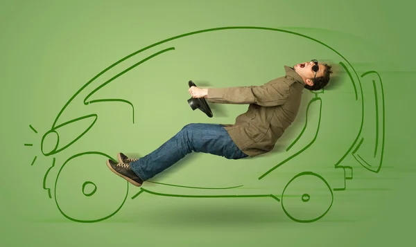 Mann fährt umweltfreundliches Elektroauto — Stockfoto