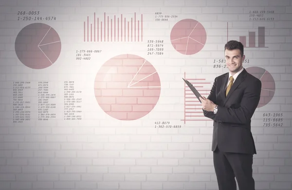 Paj diagram och siffror på väggen med försäljare — Stockfoto