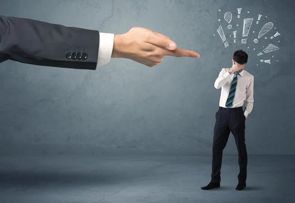 Boss hand firing guilty businessman — Stock Photo, Image