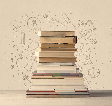 Okul el çizimleriyle dolu bir kitap yığını.