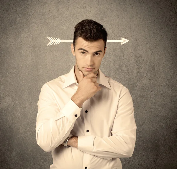 Young sales guy with arrow in the head — Stock Photo, Image