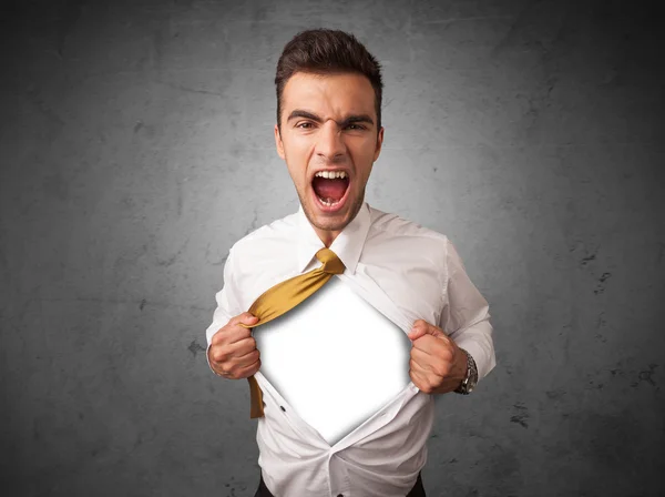 Businessman tearing off his shirt with white copyspace on chest — Stock Photo, Image