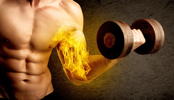 Muscular bodybuilder lifting weight with flaming biceps concept — Stock Photo, Image