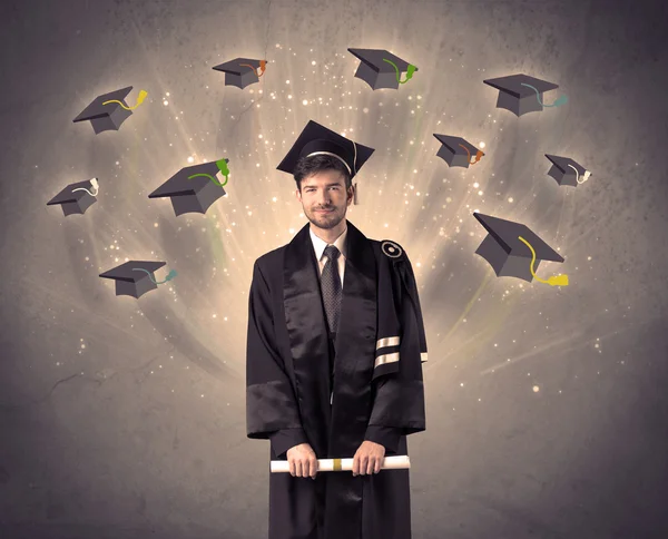 College graduate with many flying hats — Stock Photo, Image