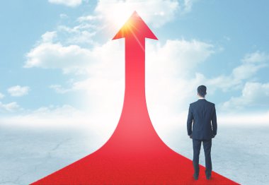 üzerinde kırmızı bir ok ayakta işadamı