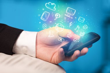 El smartphone Medya simgeler ile tutarak 