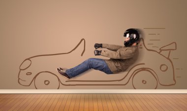 Happy man driving an hand drawn car on the wall clipart